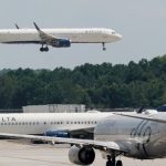 passengers-evacuate-plane-on-slides-after-delta-flight-aborts-takeoff