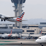 flight-reductions-and-delays-could-last-another-week,-officials-say